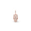 Rose gold skull pendant with a diamond on a white background