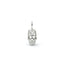 Gold skull pendant with a diamond on a white background