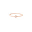 Rose gold ring with a small diamond on a white background