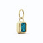 A vivid blue emerald cut diamond bezel set with ribbed edges. With jump ring bail. Available in yellow, rose, and white gold. 