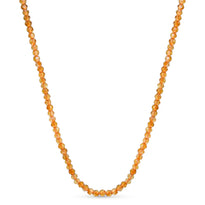 A round 2mm faceted beaded gemstone necklace available in many bight solid hues. Great for summer, solid 14k yellow gold clasp. 