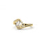 Gold ring with a clear gemstone on a white background