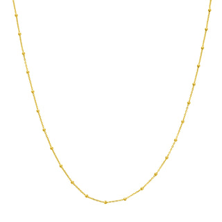 Solid yellow gold beaded station chain with a gold beaded accent evenly spacing out on a cable chain.