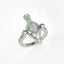Silver ring with a colorful opal stone on a white background