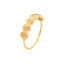 Gold ring with shell designs on a white background