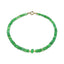 A bright colored opal beaded bracelet with solid gold beaded accents and round clasp. 