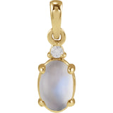 A blue oval moonstone pendant with a accent diamond on top. Made in 14k solid gold.