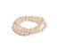 A set of three stretch pearl bracelets made with different size fresh water pearls for some texture. 
