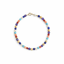 Multicolored beaded necklace on a white background
