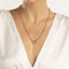 A gold chain with round rolo links and two round loops at the ends meant to be worn with connector or lock clasp.