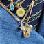 a necklace stack with various charms