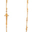 A long necklace with unique bone link chains. One of the links is a skull dagger the ends has a toggle clasp. 