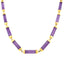 A vintage necklace with purple jade tube links. This station necklace is unique and elegant. The purple jade tube covers each links ends. 