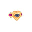 A gold vermeil heart ring with two ruby pillar designs are two sides of the heart and in the center of the heart, there is a realistic eye with heart iris.