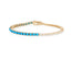 A tennis bracelet with a twist, this solid gold half diamond and half turquoise bracelet is a great modern twist to a classic look. with seamless clasp. 