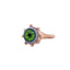 A solid gold ring with hand painted green eye set in a bezel set ring. The frame has a gold beaded design. 