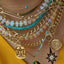A high quality hand knotted Ethiopian white opal with silk threads and gold beaded accents and wheel clasp. Styled with other clasps.