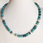 A large turquoise blue beaded necklace with pearls hand knotted with crystals for a mixed look. Finished with solid gold findings and gold clasp. 