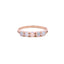 A simple gold band ring made with five round opal cabochon gemstones. Four prong set. 